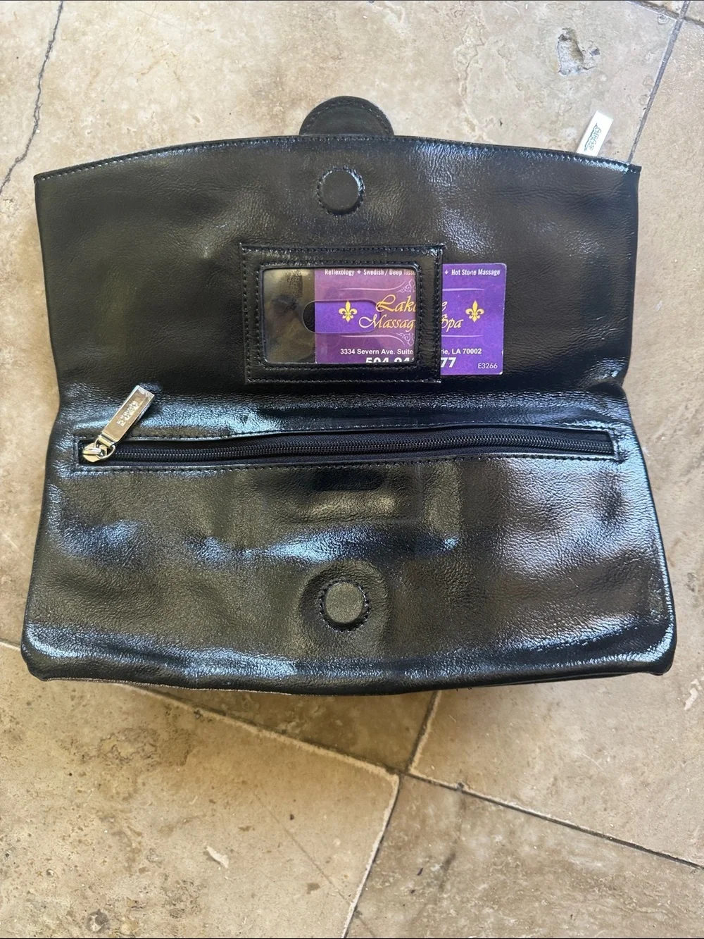 HOBO black leather fold over clutch preowned good condition